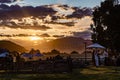 Event center on a Barley field with a backdrop of the Southern Alps at sunset in Wanaka Otago New Zealand Royalty Free Stock Photo