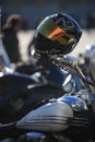 Black helmet with mirror visor on a handlebar Royalty Free Stock Photo