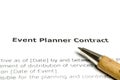 Event planner contract with wooden pen