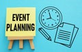 Event planning is shown using the text and picture of clock Royalty Free Stock Photo