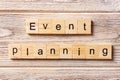 Event planning word written on wood block. Event planning text on table, concept Royalty Free Stock Photo