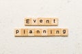 Event planning word written on wood block. Event planning text on table, concept Royalty Free Stock Photo