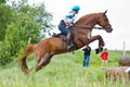 Eventer on horse is jump the cross-country fence Royalty Free Stock Photo