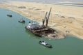 Ever Given container ship has been dislodged and is now refloating in the Suez Canal in Egypt Royalty Free Stock Photo