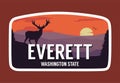 Everett with deer silhouette and sunset background