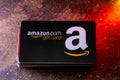 Amazon Gift Card on Top of A Stack of Credit Cards