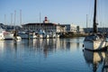 Boat mooring with Anthony`s Homeport Restaurant on Port Gardner bay