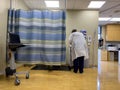 Everett, WA USA - circa April 2023: Wide view someone in a lab coat preparing to draw blood for lab work at Swedish Mill Creek