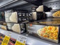 Everett, WA USA - circa August 2022: Angled, selective focus on P. F. Changs freezer meals for sale inside an Albertsons grocery Royalty Free Stock Photo