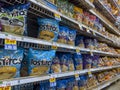 Everett, WA USA - circa July 2022: Angled, selective focus on Tostitos and other Frito Lay chip products for sale inside a Fred Royalty Free Stock Photo