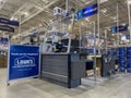 Everett, WA USA - circa July 2022: Angled view of a checkout counter inside a Lowes Home Improvement store
