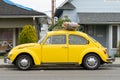 Circa 1973 Vintage Yellow Volkswagon Beetle