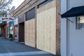 Closed Downtown Business Boarded up due to state mandated social distancing order Royalty Free Stock Photo