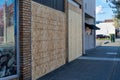 Closed Downtown Business Boarded up due to state mandated social distancing order Royalty Free Stock Photo