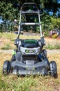 Go Electric Battery Powered Lawn Mower on a Sunny Day