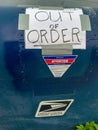 USPS postal drop box with hand written out of order sign on it in front of local Post Office Royalty Free Stock Photo