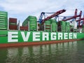 Evergreen - the biggest container ship at Terminal Burchardkai in the port of Hamburg, Germany Royalty Free Stock Photo