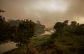 Evergreen rainforest mountains captured during an early foggy morning at Kaziranga National Park, Assam, Northeast, India. Royalty Free Stock Photo