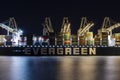 Evergreen ship loading containers in port