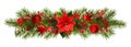 Evergreen twigs of Christmas tree and decorations in a festive garland Royalty Free Stock Photo