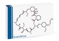 Everolimus molecule. It is derivative of Rapamycin sirolimus, immunosuppressant. Skeletal chemical formula. Paper packaging for Royalty Free Stock Photo