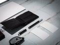 Every day carry man items collection: glasses, wallet, knife, . Royalty Free Stock Photo