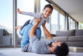 Every day is fun with dad. a young father playing with his son at home. Royalty Free Stock Photo