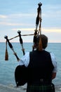 Female Bagpiper at Station Beach, Kincardine, Ontario on Tuesday, July 31,2018 Royalty Free Stock Photo