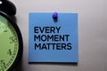 Every Moment Matters text on sticky notes isolated on office desk Royalty Free Stock Photo
