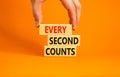 Every second counts symbol. Concept words Every second counts on wooden blocks on a beautiful orange table orange background. Royalty Free Stock Photo