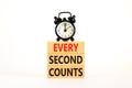 Every second counts symbol. Concept words Every second counts on wooden blocks on a beautiful white table white background. Black Royalty Free Stock Photo