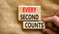 Every second counts symbol. Concept words Every second counts on wooden blocks on a beautiful canvas table canvas background. Royalty Free Stock Photo