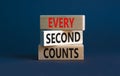 Every second counts symbol. Concept words Every second counts on wooden blocks on a beautiful grey table grey background. Business Royalty Free Stock Photo