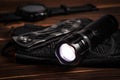 Everyday carry EDC items for men in black color - included flashlight, watch and knife. Survival set. Minimal concept. Royalty Free Stock Photo