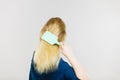 Blonde woman brushing hair back view Royalty Free Stock Photo