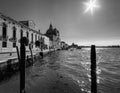 Everyday life of a gondolier. Walking on the bridges of the old city of Venice. Bright sun. The beauty of the ancient city. Italy Royalty Free Stock Photo