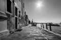 Everyday life of a gondolier. Walking on the bridges of the old city of Venice. Bright sun. The beauty of the ancient city. Italy Royalty Free Stock Photo