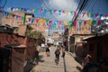 Everyday life at Katmandu streets. Nepals capital, is set in a valley surrounded by the Himalayan mountains