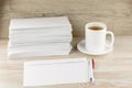 Everyday life of an office worker - monotonous stack of envelopes, an envelope and pen lie ahead on the desktop, with a fresh Cup Royalty Free Stock Photo