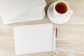 Everyday life of an office worker - monotonous stack of envelopes, an envelope and pen lie ahead on the desktop, with a fresh Cup Royalty Free Stock Photo