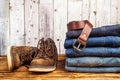 Everyday trend - jeans, leather shoes, leather belt with buckle Royalty Free Stock Photo