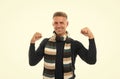 everyday winner. excited man isolated on white. keep neck warm. feel comfortable. happy man in knitted scarf. cheerful