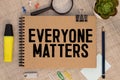 Everyone Matters phrase written on a grunge paper