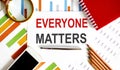 Everyone Matters text on paper with office background Royalty Free Stock Photo