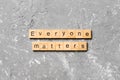 Everyone matters word written on wood block. Ever yone matterstext on cement table for your desing, Top view concept Royalty Free Stock Photo