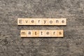 Everyone matters word written on wood block. Ever yone matterstext on cement table for your desing, Top view concept Royalty Free Stock Photo