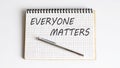 Everyone Matters written on a notepad with pen Royalty Free Stock Photo