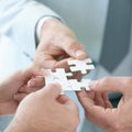 Everything has its place. A business concept image of puzzle pieces fitting together - closeup. Royalty Free Stock Photo