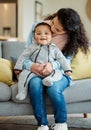 He is everything I thought he would be. a young mother bonding with her baby boy on the sofa at home. Royalty Free Stock Photo