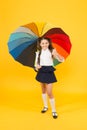 Everything under control. Fancy schoolgirl. Girl with umbrella. Rainy day. Happy childhood. Rainbow umbrella. Kid happy